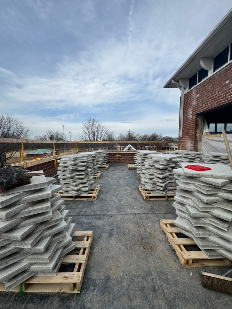 Piles of titles on the outdoor patio.